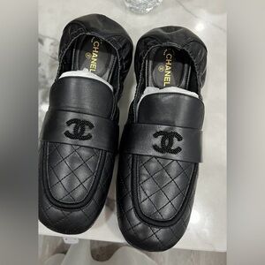 Chanel flats, worn . Bottoms worn . Leather like new
